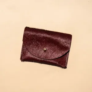 Primecut – Plum Hair on Cowhide Holder